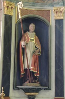 Statue de Saint Gwenaël à la droite de l'autel de l'église paroissiale